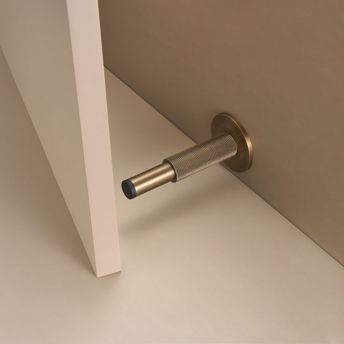 Knurled Brass Door Stopper